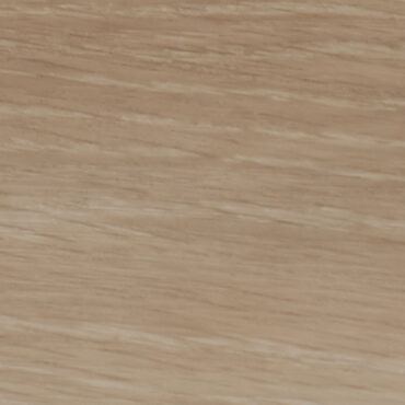 A sample swatch of the Jeydon Stone flooring, featuring a soft, neutral stone-grey tone with subtle texture and shading variations, giving it a modern yet earthy look.