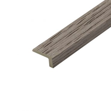 Detailed view of 'Delilah Grey' vinyl flooring arranged in an L-shape pattern. The flooring displays a soft grey hue with a refined texture, ideal for creating a stylish and modern atmosphere. The L-shape layout highlights the flooring's adaptability to various room setups.