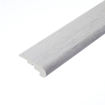 A detailed image of the Alfie Grey Stair Nosing, showcasing a sleek, medium-grey tone with a refined, smooth surface. The nosing is designed for stair protection, creating a seamless transition for modern interiors.