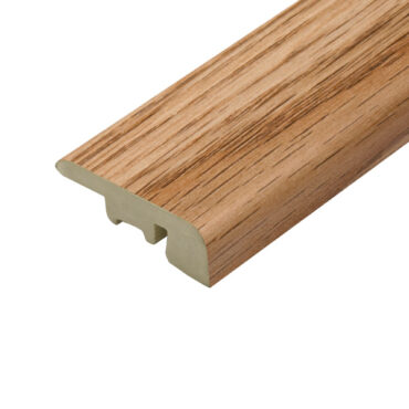 A detailed close-up of the end profile of the Charlie Oak flooring plank from Pro-Tek™. The image highlights the natural oak colour, realistic wood grain, and the smooth, precise edges designed for a perfect fit.