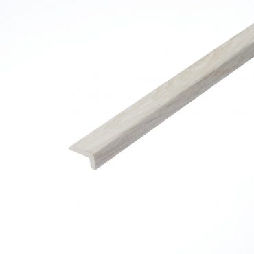 A detailed image of the Hoxton Pebble L-Shape Profile, showcasing a light, pebble-grey finish. The smooth edges and neutral tone provide a sleek, modern look, perfect for use on steps or edge transitions.