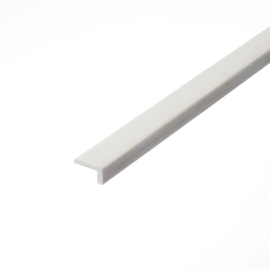 Bishops White L-Shape Profile: A detailed photograph of the Bishops White L-shape profile. This piece is characterized by its bright white colour and clean lines, suitable for providing a neat finish to the edges of flooring installations.