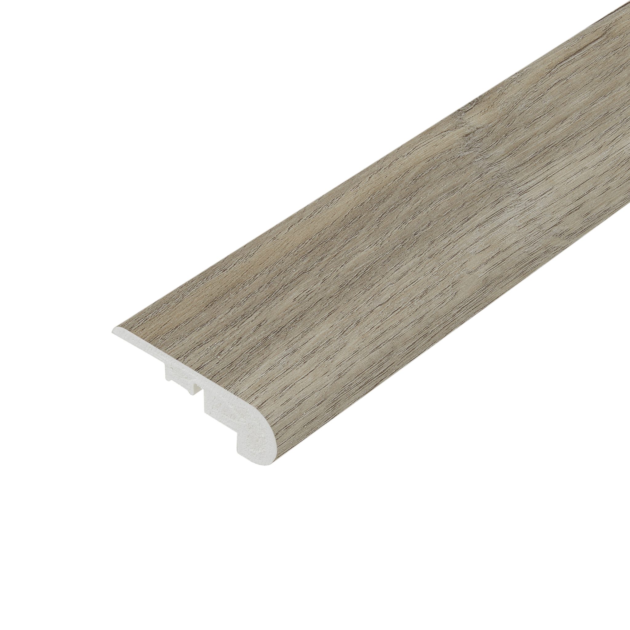A photograph of C800 Hyde Beige stair nosing. The profile has a beige colour with a durable, rounded edge, used to protect stair edges while ensuring a consistent look with the rest of the flooring.