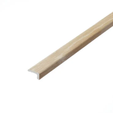 An image of H06 Chartwell Stone L-Shape profile. This profile features a light grey colour and a right-angled shape, ideal for transitioning between horizontal and vertical surfaces seamlessly.