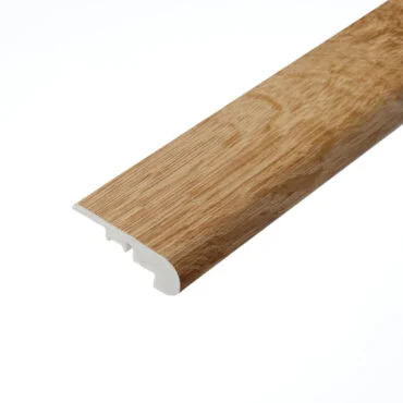 Harewood Oak Stair Nosing: A close-up view of the Harewood Oak stair nosing profile. This piece, featuring a warm oak colour, is crafted to protect stair edges and provide a smooth transition between steps while adding a touch of elegance.