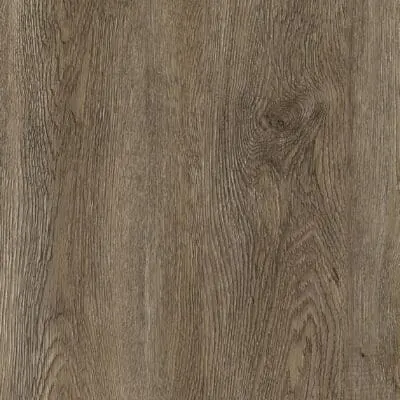 A close-up of flooring planks laid out, showcasing the natural wood textures and colour variations that make each plank unique.